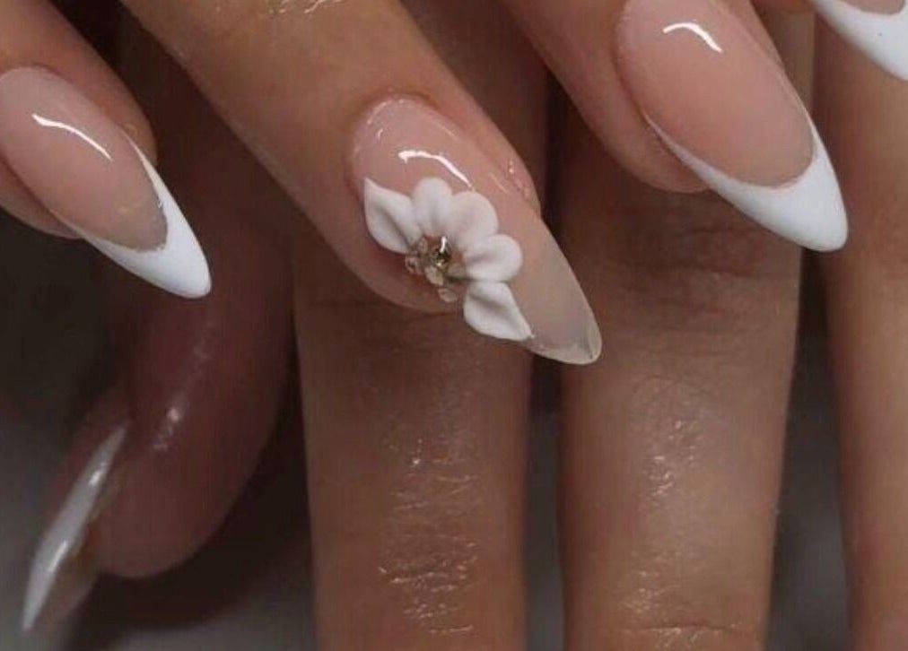 Elegant nail art with white floral design at BU Aesthetics in Benoni, Gauteng, ZA