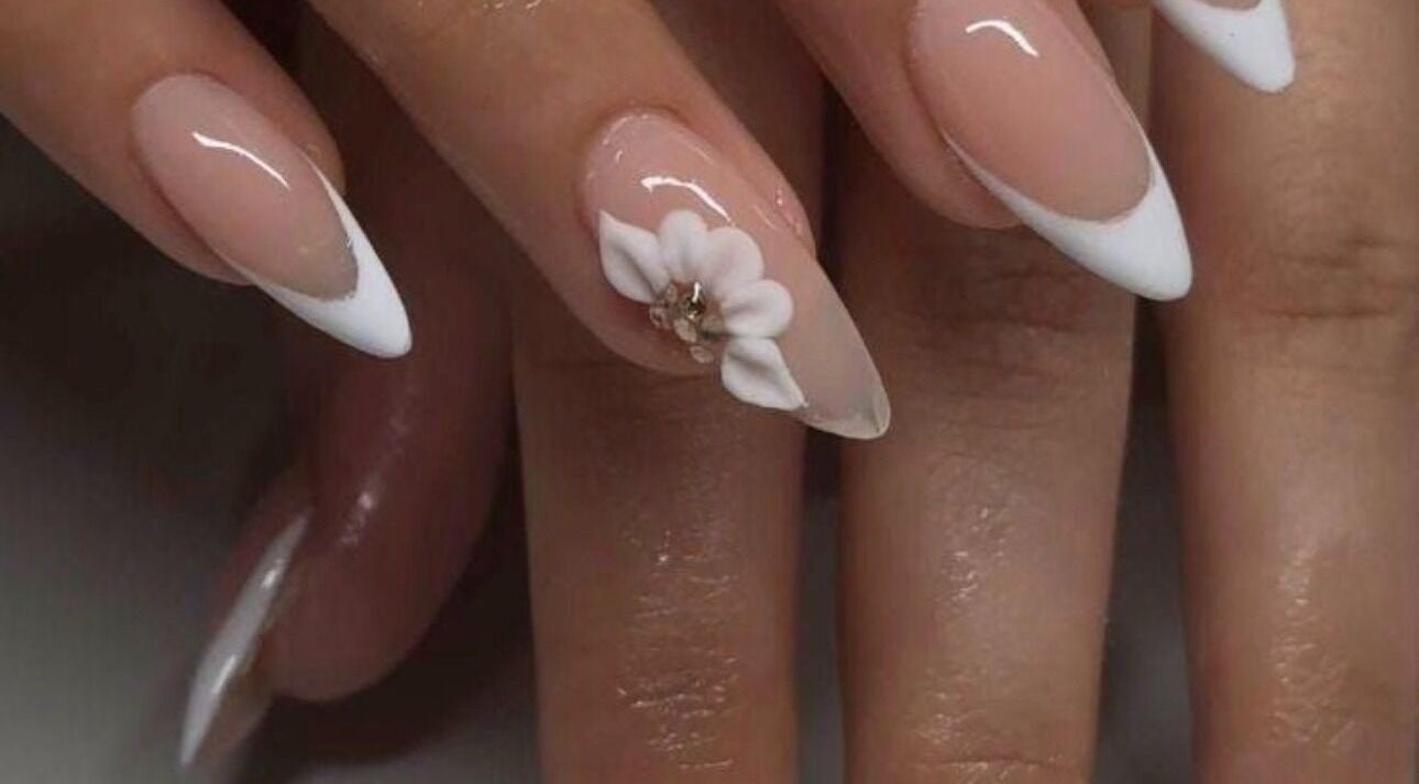 Elegant nail art with white floral design at BU Aesthetics in Benoni, Gauteng, ZA