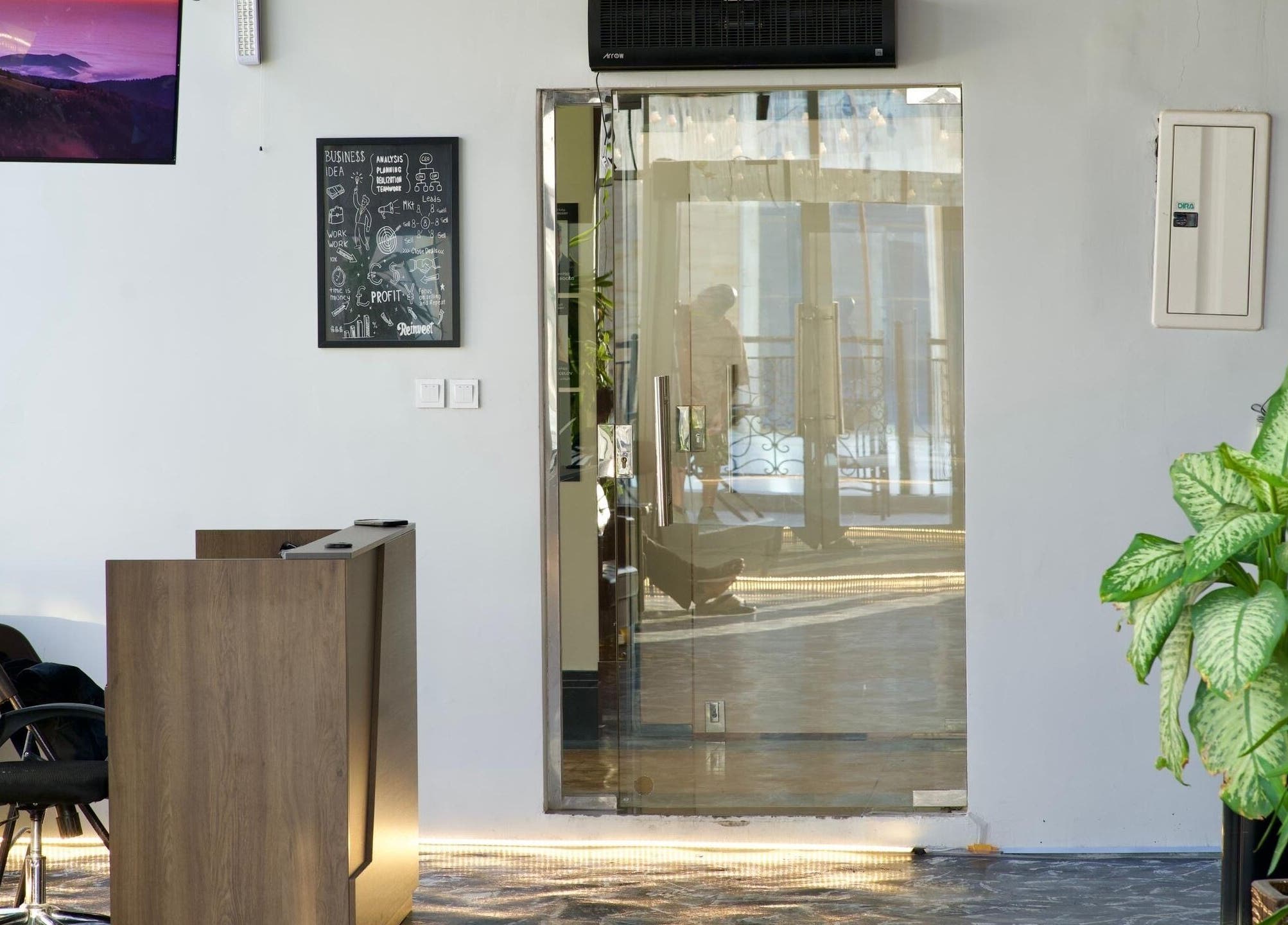 Modern reception at Faded, الخبر, المنطقة الشرقية, SA, showcasing sleek design and lush greenery.