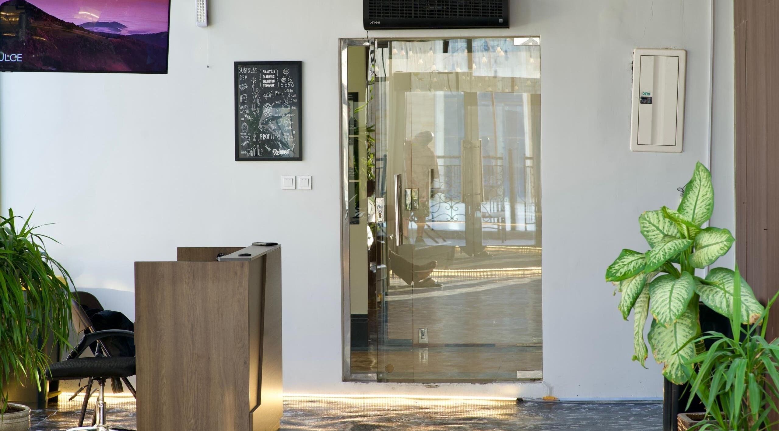 Modern reception at Faded, الخبر, المنطقة الشرقية, SA, showcasing sleek design and lush greenery.