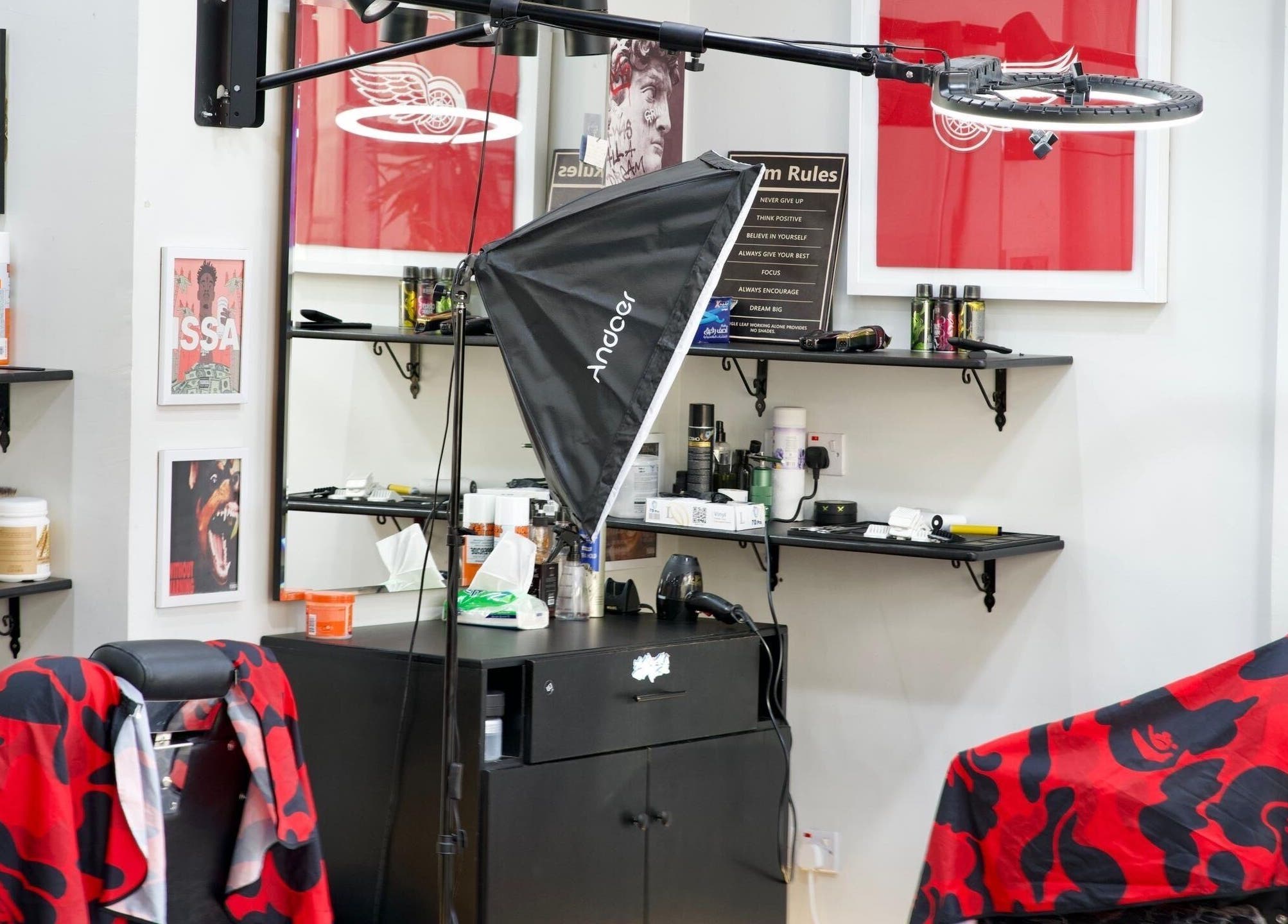 Modern salon interior at Faded, الخبر, المنطقة الشرقية, SA, showcasing trendy decor and professional equipment.