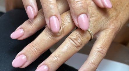 Close-up of elegant pink manicure at BeautyByJess, Sheffield, England, GB. Showcasing flawless nail care.