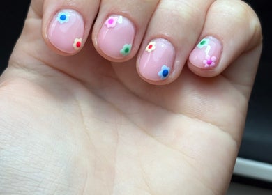 Pastel floral nail art at BeautyByJess, Sheffield, England, GB. Vibrant colors for personal expression.