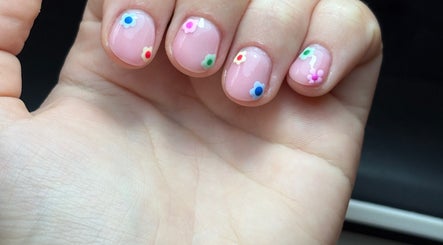 Pastel floral nail art at BeautyByJess, Sheffield, England, GB. Vibrant colors for personal expression.