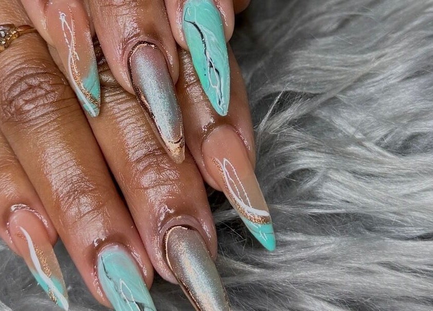 Stylishly painted nails showcased at Reign Lash and Brow, Georgetown, Demerara-Mahaica, GY.