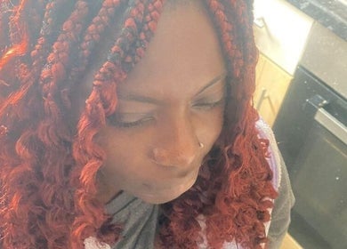 Stylish red curls at Beautcon, Seaton Delaval, England, GB, showcasing unique hair artistry.