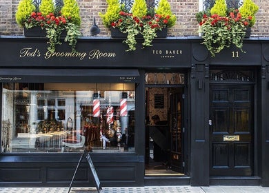 Ted's Grooming Room: Mayfair - Curzon Street, elegant black storefront, London, England, GB.