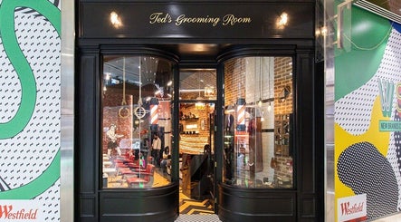 Entrance of Ted's Grooming Room: Westfield - Stratford in London, England, GB showcasing chic barber aesthetics.