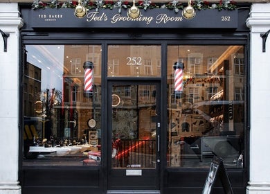 Elegant storefront of Ted's Grooming Room: Kensington - High Street in London, England, GB showcasing luxury grooming.
