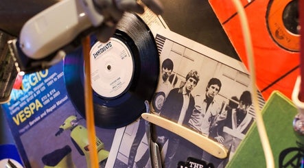 Retro decor at Ted's Grooming Room: Chelsea - King's Road, London, England, GB. A cozy, stylish barbershop.