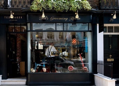 Exterior of Ted's Grooming Room on Charlotte Street, Fitzrovia. London, England, GB barbershop style.