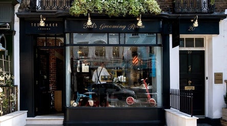 Exterior of Ted's Grooming Room on Charlotte Street, Fitzrovia. London, England, GB barbershop style.