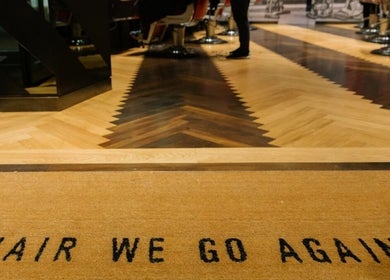Stylish entrance mat at One New Change - Bank, Ted's Grooming Room, London, England, GB.