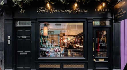 Exterior of Berwick Street Ted's Grooming Room, stylish barber shop in London, England, GB.