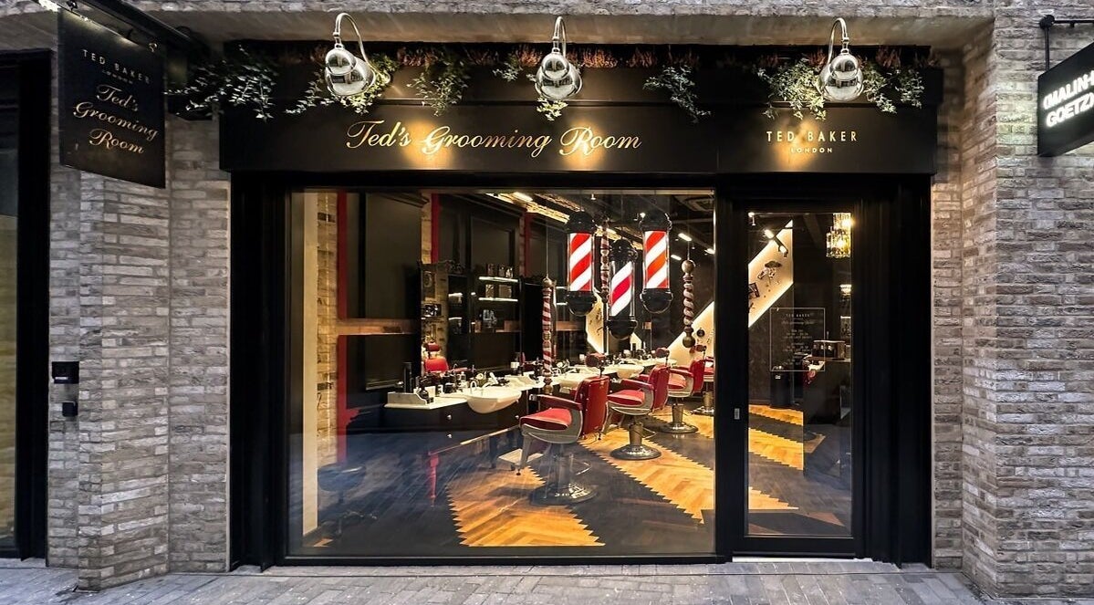 Exterior of Ted's Grooming Room in Borough Yards near London Bridge, London, England, GB, showcasing stylish interiors.