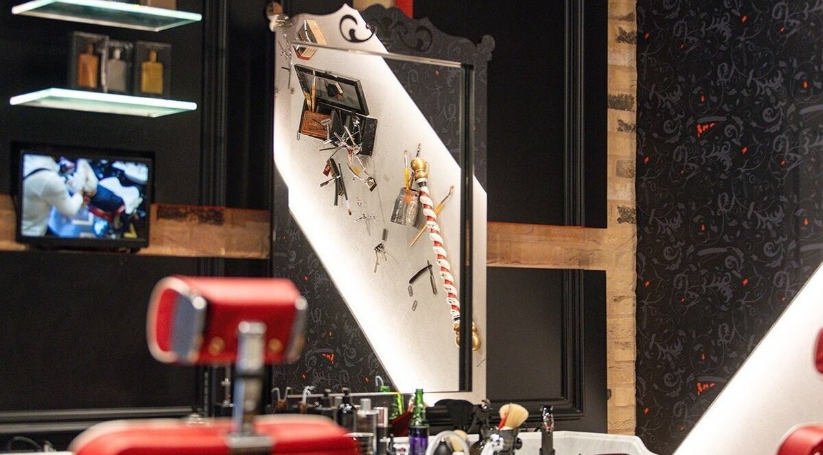 Stylish barber chair and tools at Ted's Grooming Room, London Bridge - Borough Yards, London, England, GB.
