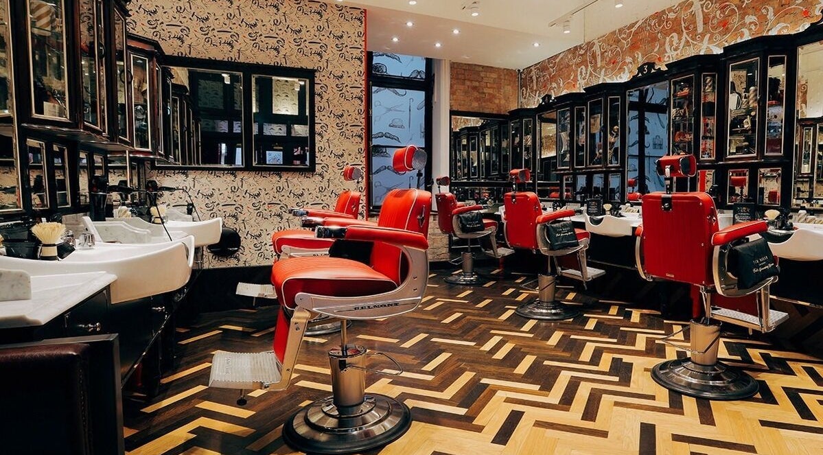 Retro barber chairs in Moorgate, Ted's Grooming Room, London, England, GB showcase classic elegance.