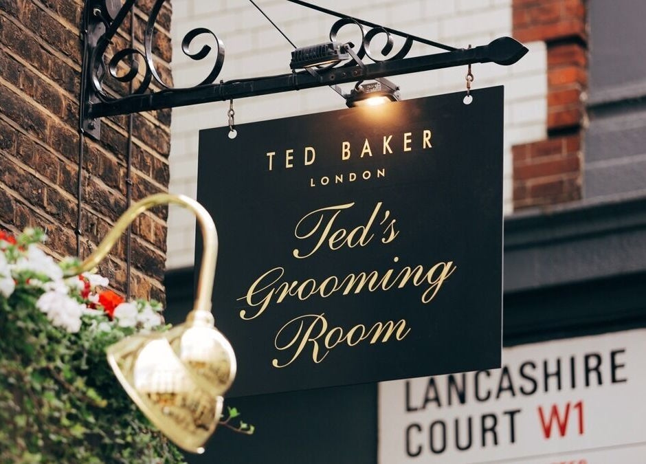 Mayfair - Avery Row, Ted's Grooming Room elegant sign in London, England, GB.