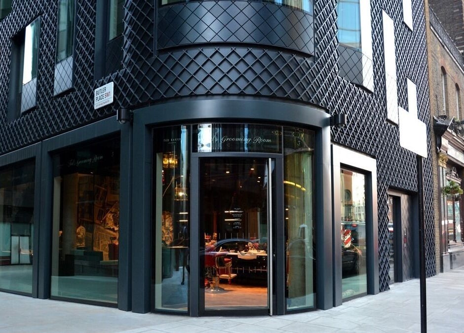 Elegant facade of Ted's Grooming Room at St. James's Park - Butler Place, London, England, GB.