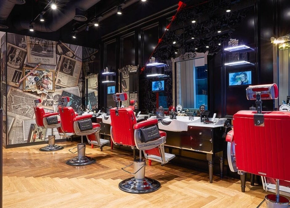 Classic barber chairs at St. James's Park - Butler Place, Ted's Grooming Room, London, England, GB.