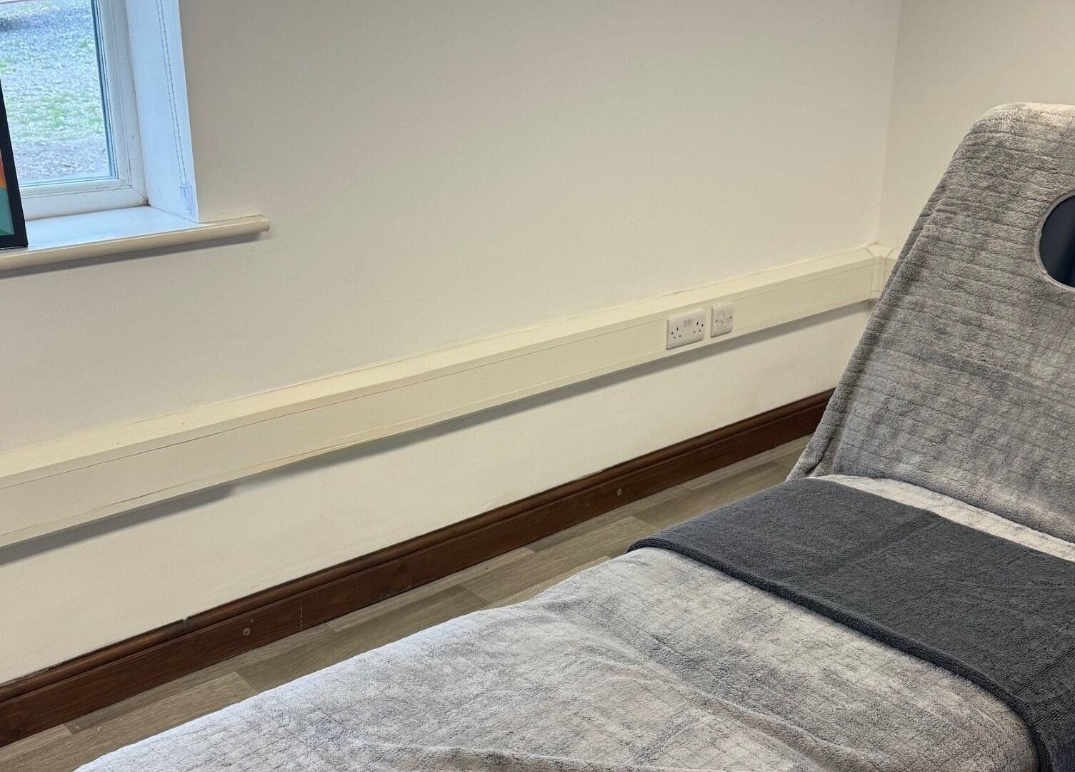 Relaxing massage chair at Marley Massage, Colne, England, GB, offering a tranquil atmosphere.