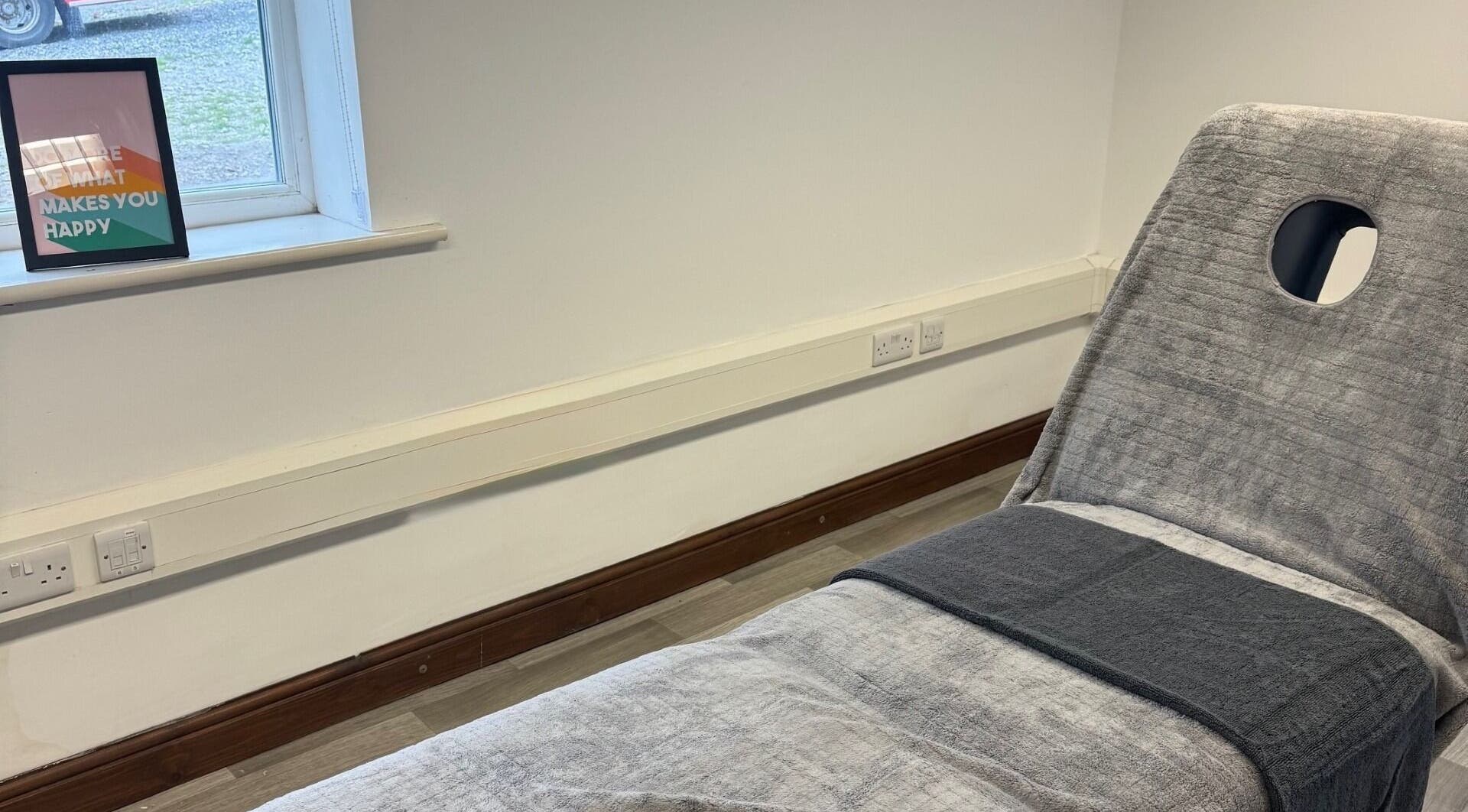 Relaxing massage chair at Marley Massage, Colne, England, GB, offering a tranquil atmosphere.