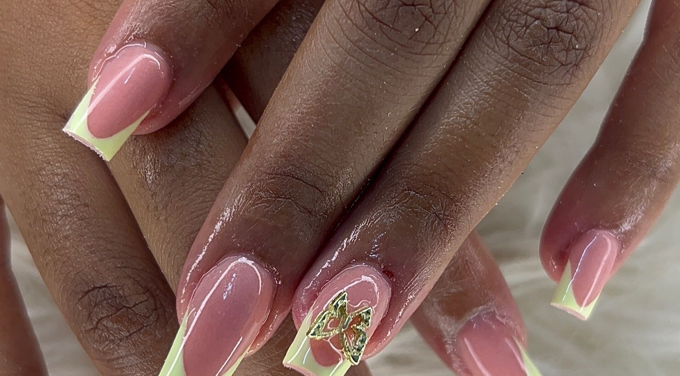 Manicure with pink and green design at FOCHVILLE, Fochville, Gauteng, ZA enhancing beauty and style.