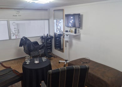 Interior of Kings Blade Barbershop, Randburg, Gauteng, ZA with vintage chairs and modern equipment.