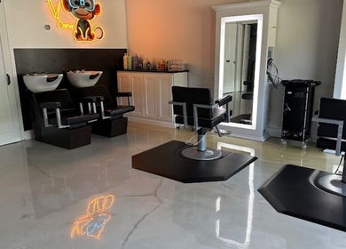 Interior of Premier Salon - Bonner Springs featuring modern styling chairs in Bonner Springs, Kansas, US.