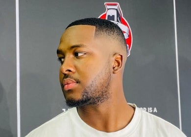 Client showcasing a fresh fade haircut at Joes Fade Cuts Grooming, Windhoek, Khomas Region, NA.