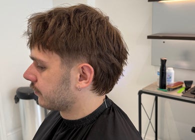 Side profile of a modern haircut at Barber Nick.LS in Twickenham, England, GB.