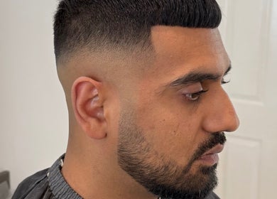 Close-up of tapered fade haircut at Barber Nick.LS, Twickenham, England, GB.