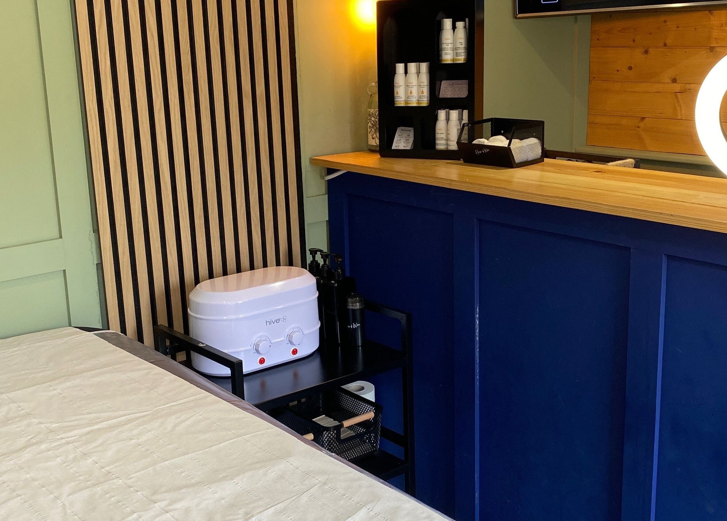 House of Wax | Waxing Salon in St Helens, England, GB featuring a cozy waxing room with relaxing ambiance.