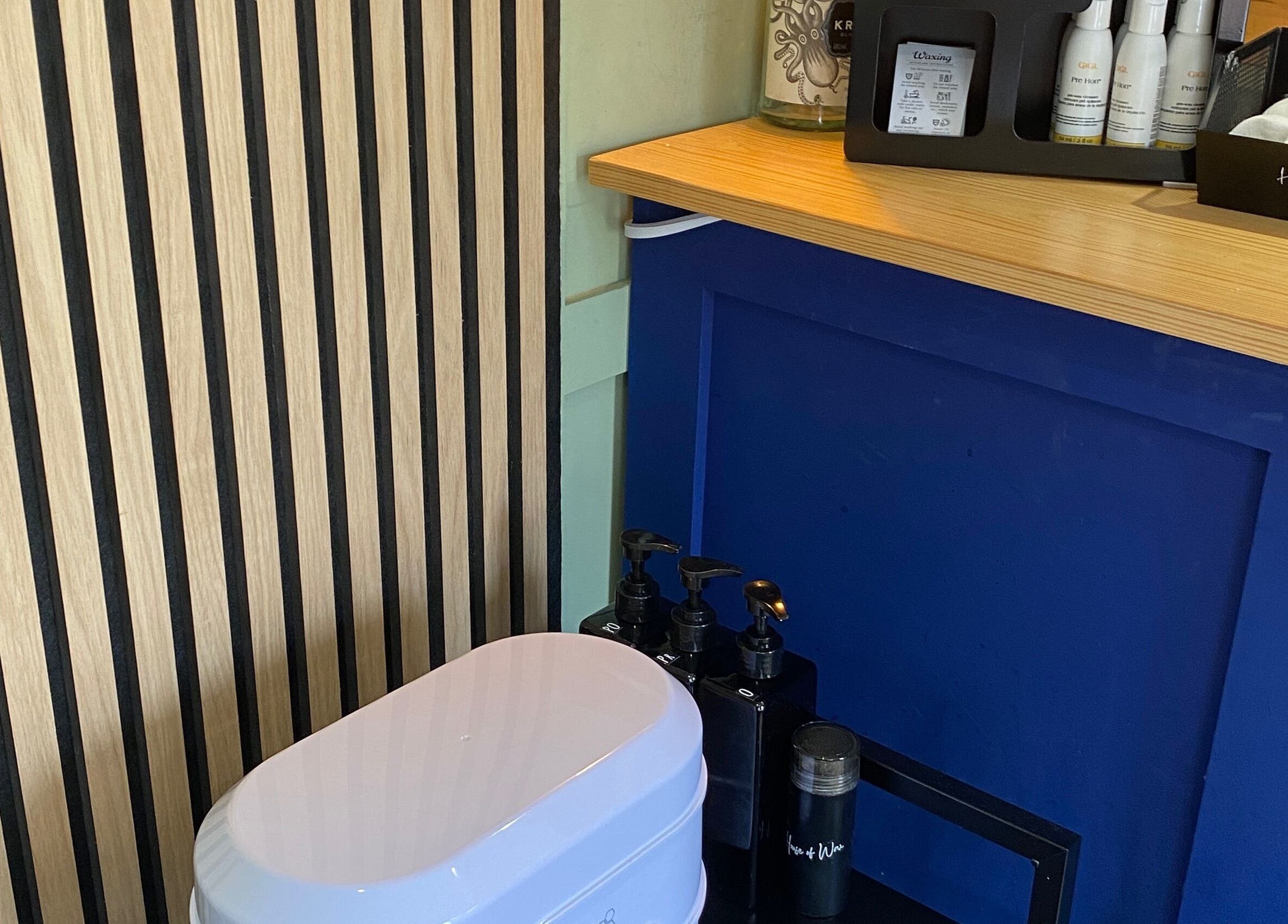 Interior of House of Wax | Waxing Salon in St Helens, England, GB showing modern wax supplies and décor.