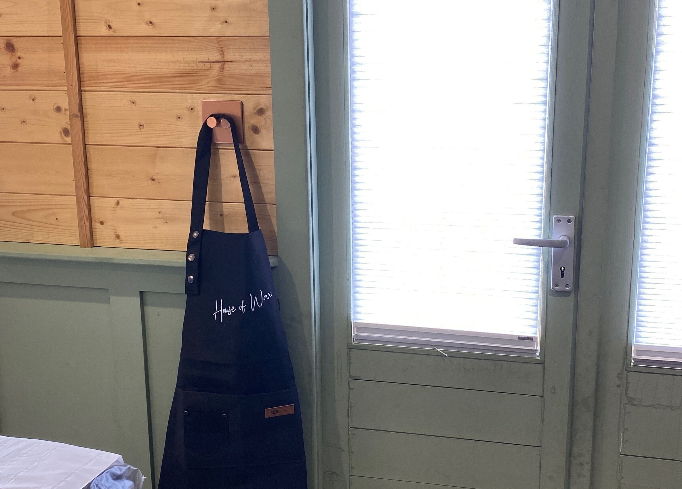 House of Wax | Waxing Salon apron on display in St Helens, England, GB enhancing tranquil decor.