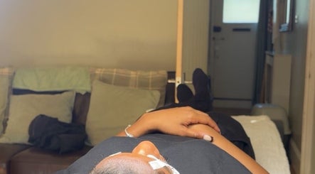 Relaxing eyelash session at Lashes By Jessie, London, England. Cozy ambiance for beauty and relaxation.