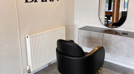 Modern salon chair and mirror at AlexandraJaine Extensions in Tickenham, England, GB.