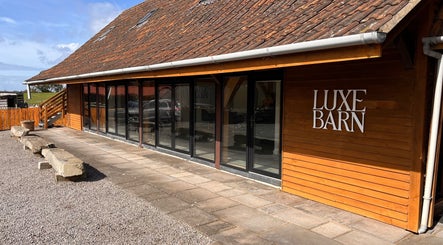 Exterior of Luxe Barn at AlexandraJaine Extensions, Tickenham, England, GB offering beauty and wellness services.