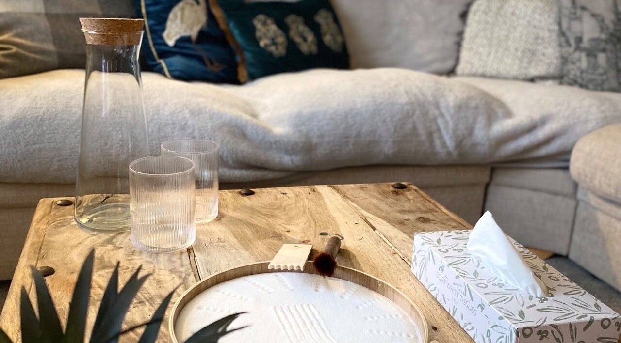 Cozy therapy room at Keystone Counselling Beverley, Beverley, England, GB with wooden table and comfy sofa.