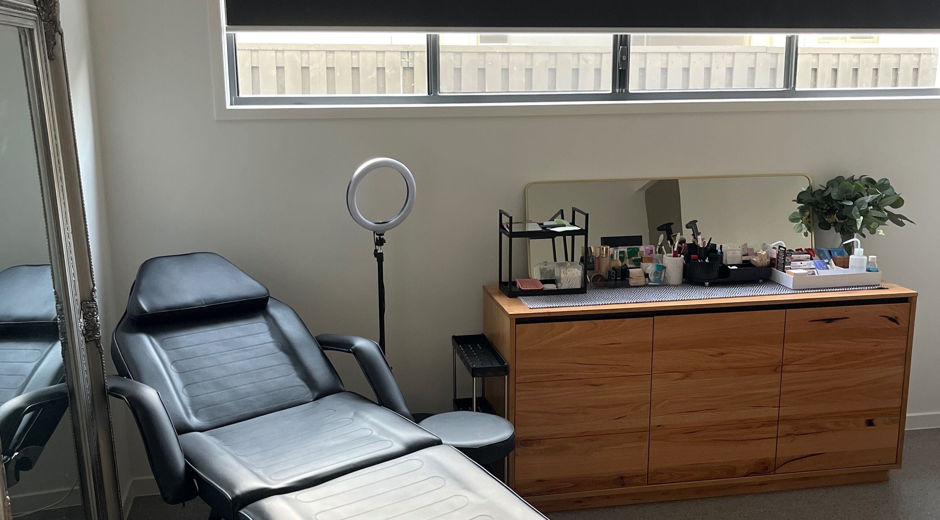 Beauty treatment room at Beauty by C.B in Palmview, Queensland, AU featuring a massage table and necessary equipment.