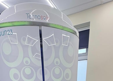 Modern tanning booth at You Glow Girl - Sunny Bz, Herne Bay, England, GB, with sleek design and lighting.