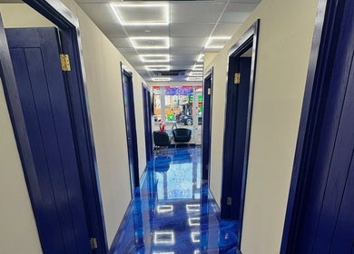 Elegant blue hallway at You Glow Girl - Sunny Bz, Herne Bay, England, GB showcasing a modern design.