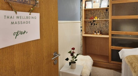 Open door to Thai Wellbeing Massage room in Maidstone, England, GB, featuring cozy decor and welcoming ambiance.