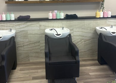 Elegant shampoo stations at Locks By Liv in St. Catharines, Ontario, CA showcasing modern design and comfort.