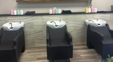 Elegant shampoo stations at Locks By Liv in St. Catharines, Ontario, CA showcasing modern design and comfort.