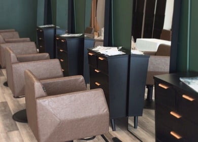 Elegant salon chairs and styling stations at Locks By Liv, St. Catharines, Ontario, CA.