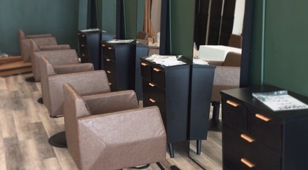 Elegant salon chairs and styling stations at Locks By Liv, St. Catharines, Ontario, CA.