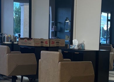 Modern salon chairs and styling stations at Locks By Liv, St. Catharines, Ontario, CA.