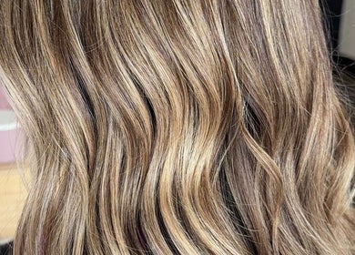 Gorgeous wavy blonde hair styled at Locks By Liv, St. Catharines, Ontario, CA.