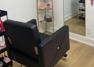 Elegant salon chair and mirror at Paradise Glamour Lounge INC., St. Catharines, Ontario, CA.